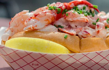 Bite Into Maine Roll.JPG