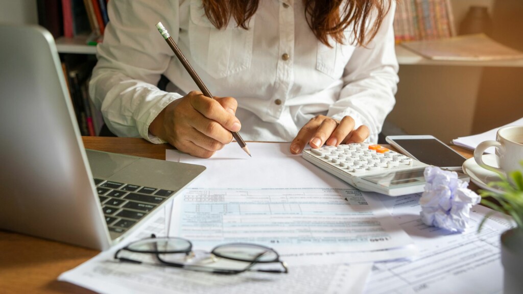 Administrative assistant taking meeting minutes