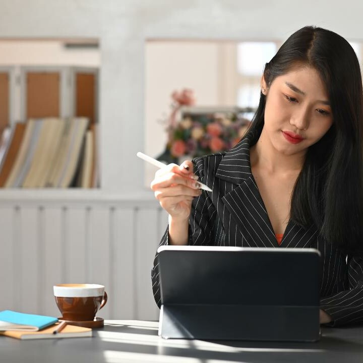 An Executive Assistant using modern admin tools to elevate her productivity.