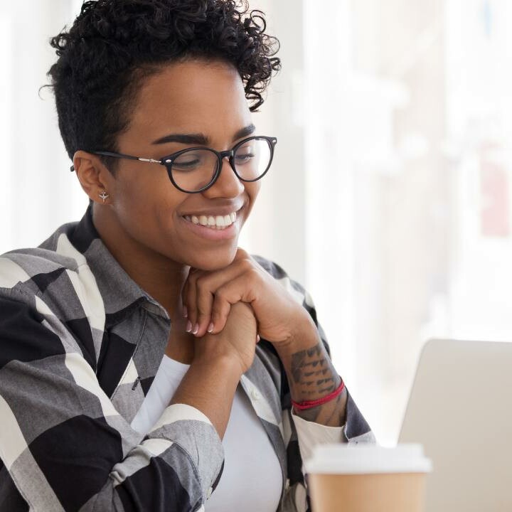 An executive assistant showing they can demonstrate the definition of adaptability in the workplace.