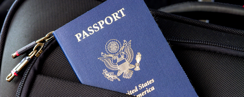 united states passport in suitcase
