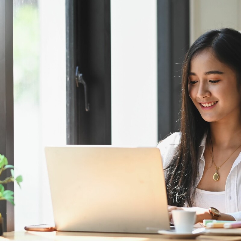 executive assistant working on her laptop