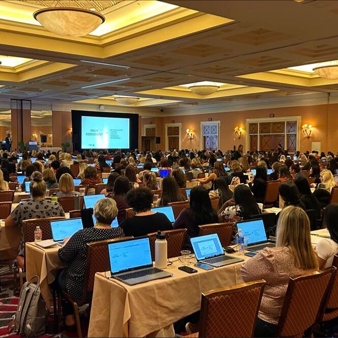 attendees in session at APC 2023