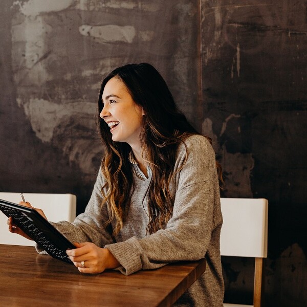 administrative professional woman smiling at work