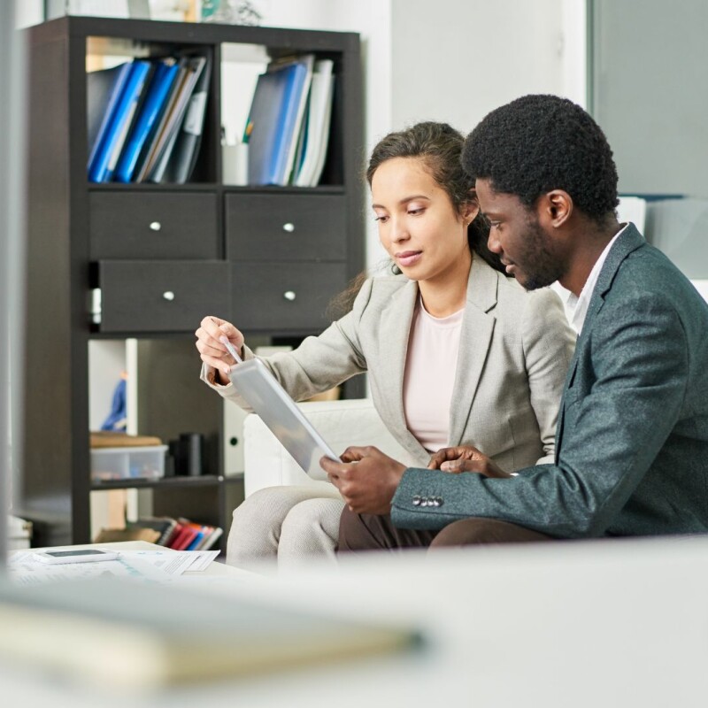 chief of staff talking to workers in a meeting