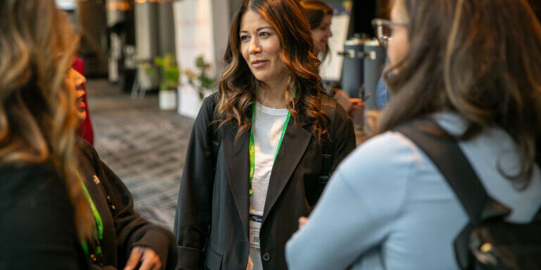 Attendees in conversation at the ASAP event EA Ignite