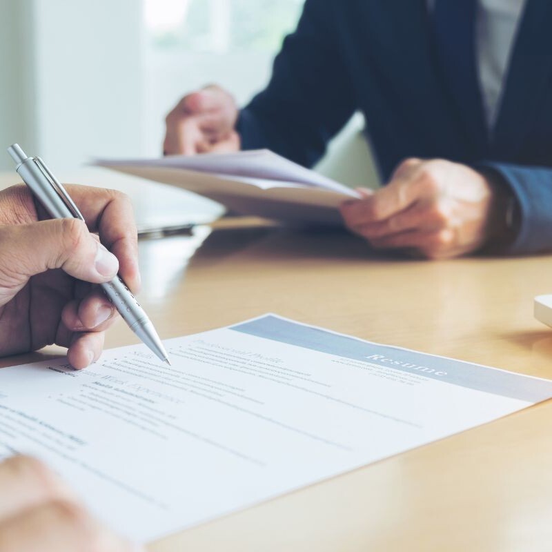 Hiring manager reviewing a resume.