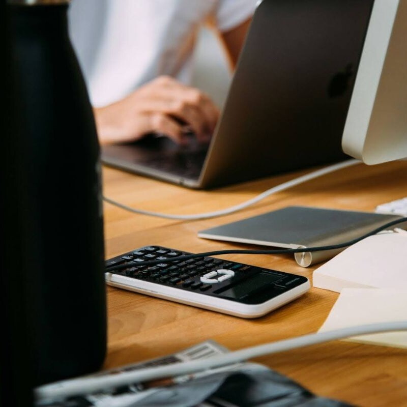 Financial administrator using a computer.