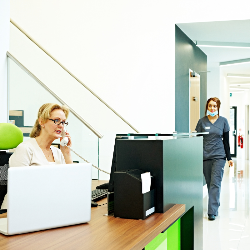 Healthcare admin scheduling appointments.