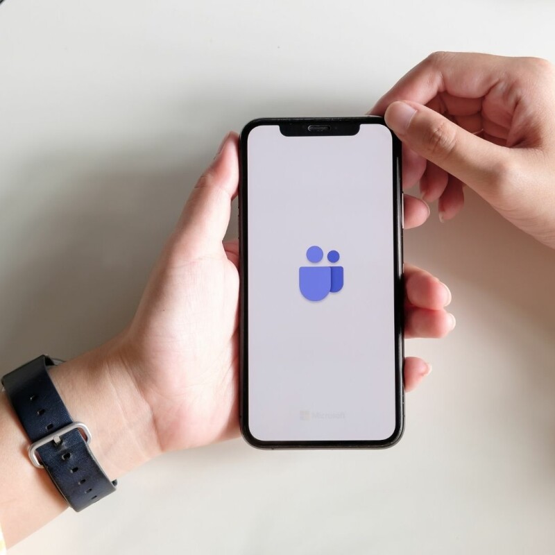 person loading into the microsoft teams application on the smart phone