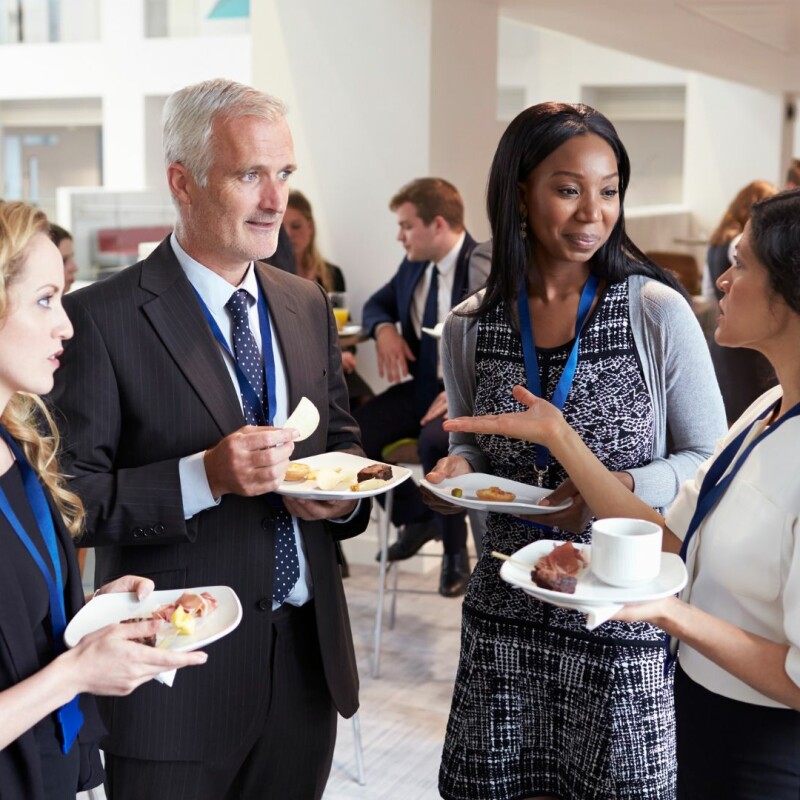 People at an event for networking for executive assistants.
