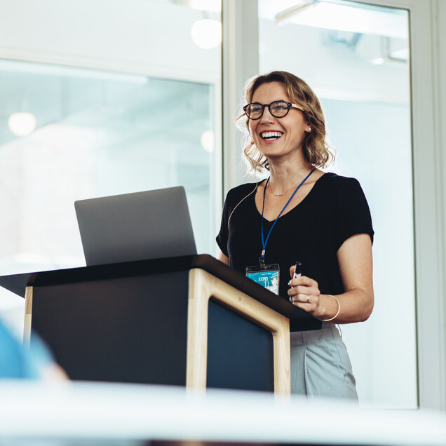 Female admin presenting to group