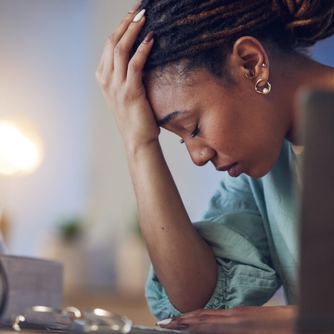 Stressed executive assistant who is dealing with adversity