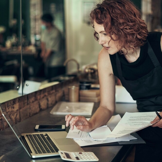 Administrative professional tracking her tasks with template