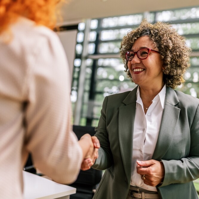 hiring manager speaking with admin interview candidate