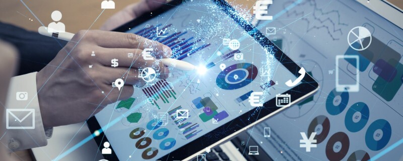 An employee uses their tablet and other technology to make conducting business easier.