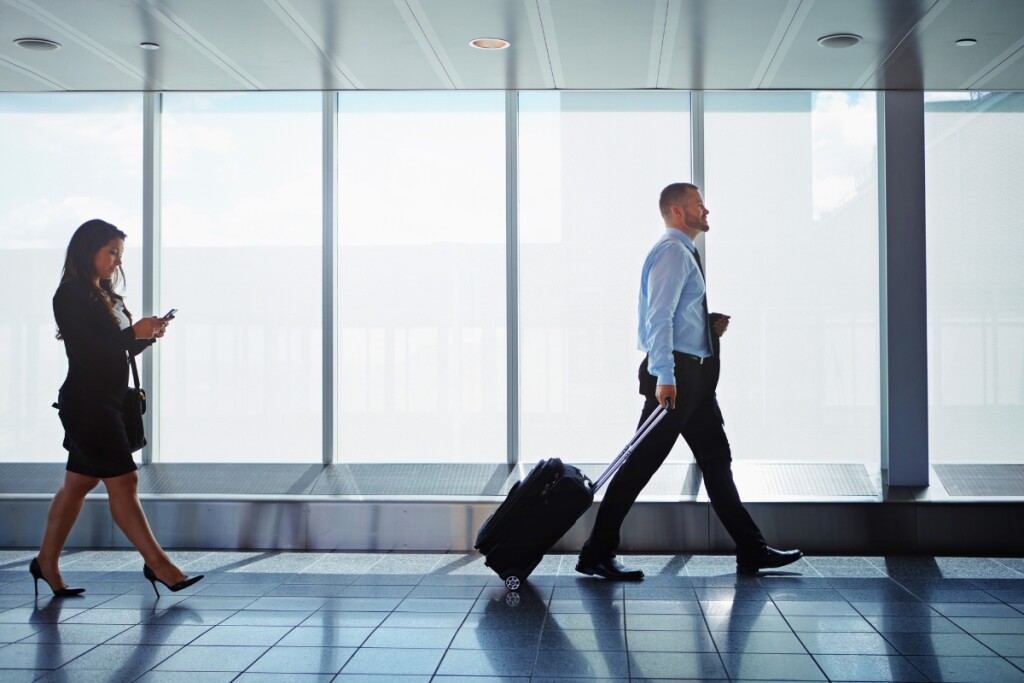 executives traveling through airport