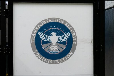A sign with the seal of the Transportation Security Administration is seen in an airport.