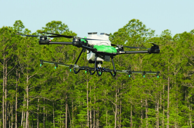 Central UAS Technologies drone flying that is equipped with pesticide sprayer