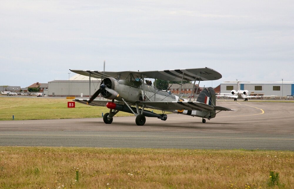A close up view of the Royal Navy W5856 Fairey Swordfish Mk1 aircraft, as it prepares to take-off from Blackpool Aerodrome, Blackpool, Lancashire, United Kingdom, Europe on Saturday, 13th, July, 2024