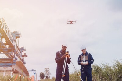 Surveying engineers use cameras and drones to survey road and high-speed railway construction sites or conduct safety inspections.