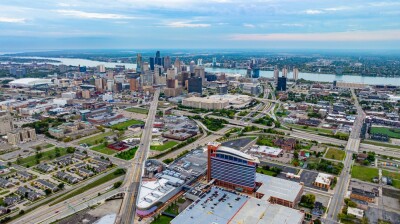 Detroit, USA, 28 July 2025: Detroit city skyline aerial view with highways and river. Aerial view of Detroit skyline with highways, skyscrapers, and the Detroit River in the distance.