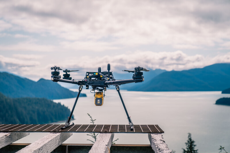 YellowScan Voyager on a drone in front of a lake