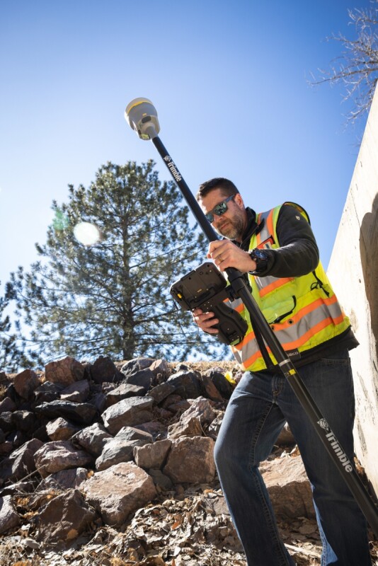 Surveyor with a Trimble R980 GNSS system