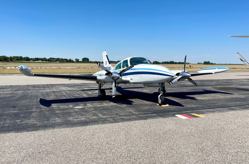 A Cessna T310R aerial survey aircraft parked at Idaho Falls Regional Airport.