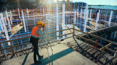 Futuristic Digitalization of Buildings Construction. Architectural Engineer Uses Virtual Reality Software Creating and Developing Commercial House.