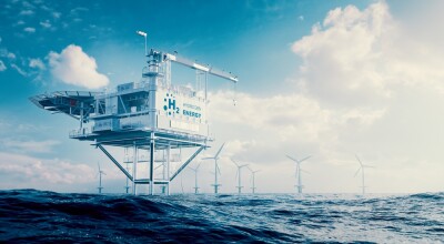 The concept of offshore hydrogen production through a hydrogen rig platform with an offshore wind turbine farm in the middle of the sea.