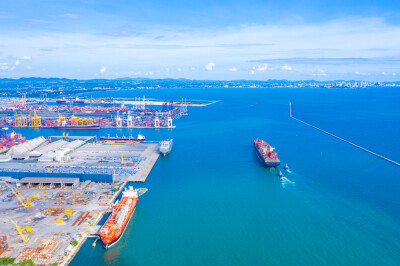 Aerial top view of International Containers Cargo ship in ocean, Freight Transportation,Shipping,Nautical Vessel. Logistics import export Container Cargo ship over sea.