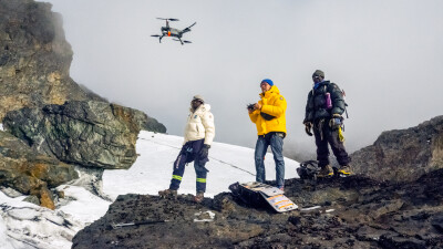 Klaus Thymann and other members of the project team fly a drone to collect imagery for the 3D maps.