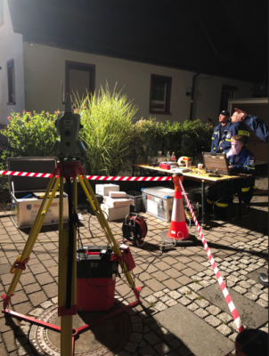 Emergency response crew on site of house fire with Leica MS50