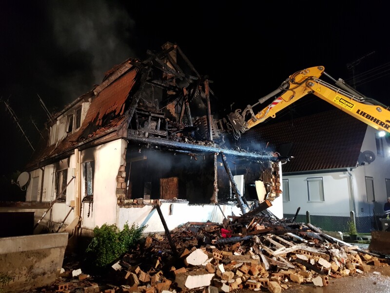 House destroyed by fire being demolished