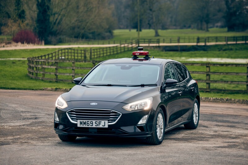 OXTS WayFinder attached to the top of a car