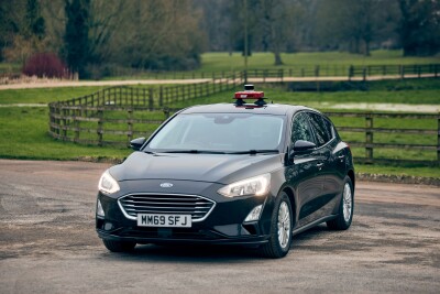 OXTS WayFinder attached to the top of a car