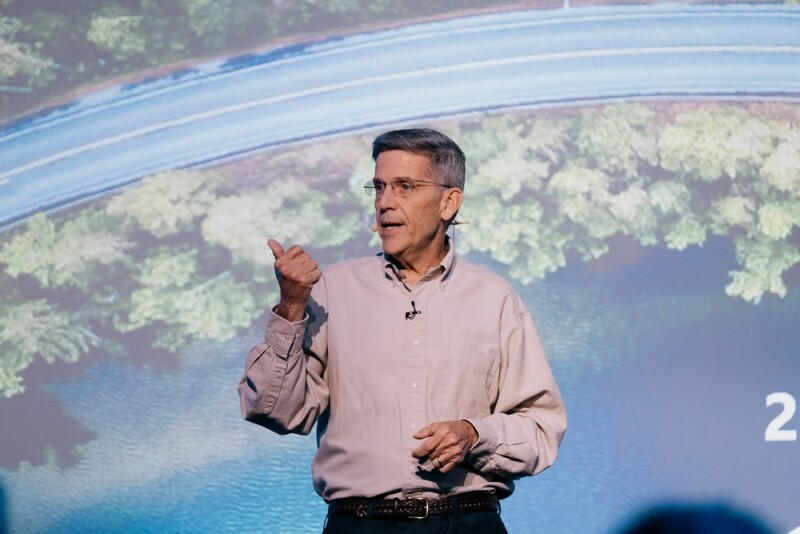 Keith Bentley speaking on stage.