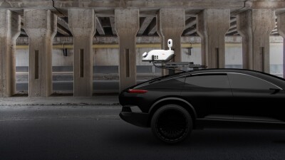 Leica Pegasus TRK100 attached to the back of a car.