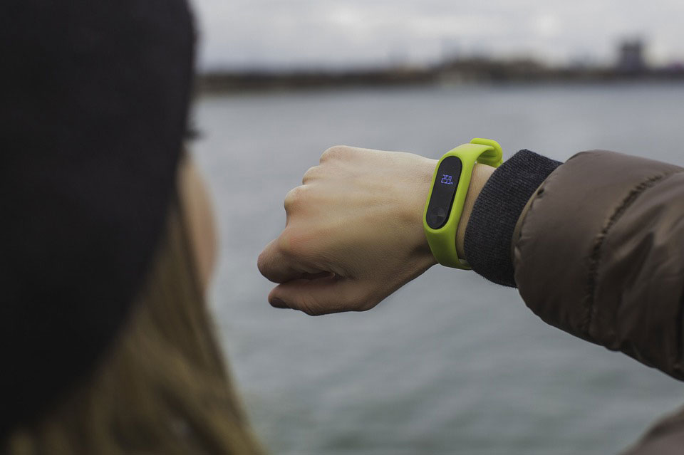 Person looking at smart watch on wrist