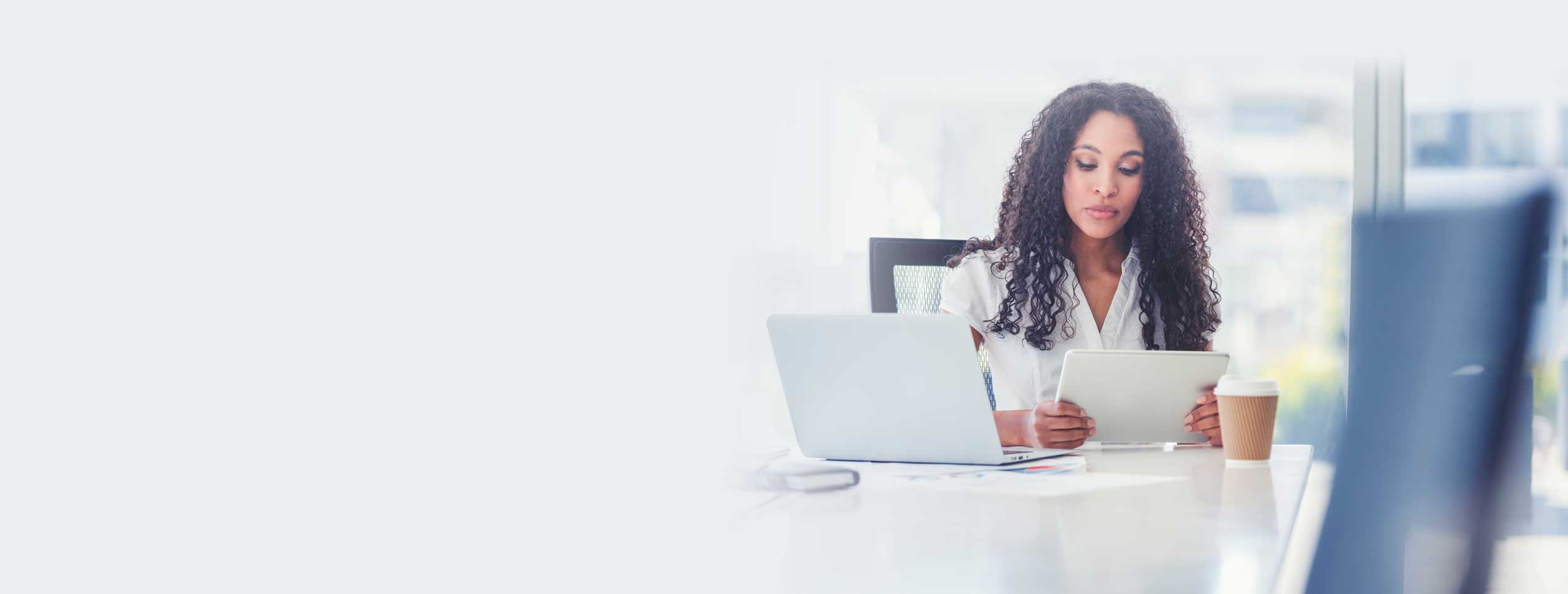 Women reading a white paper