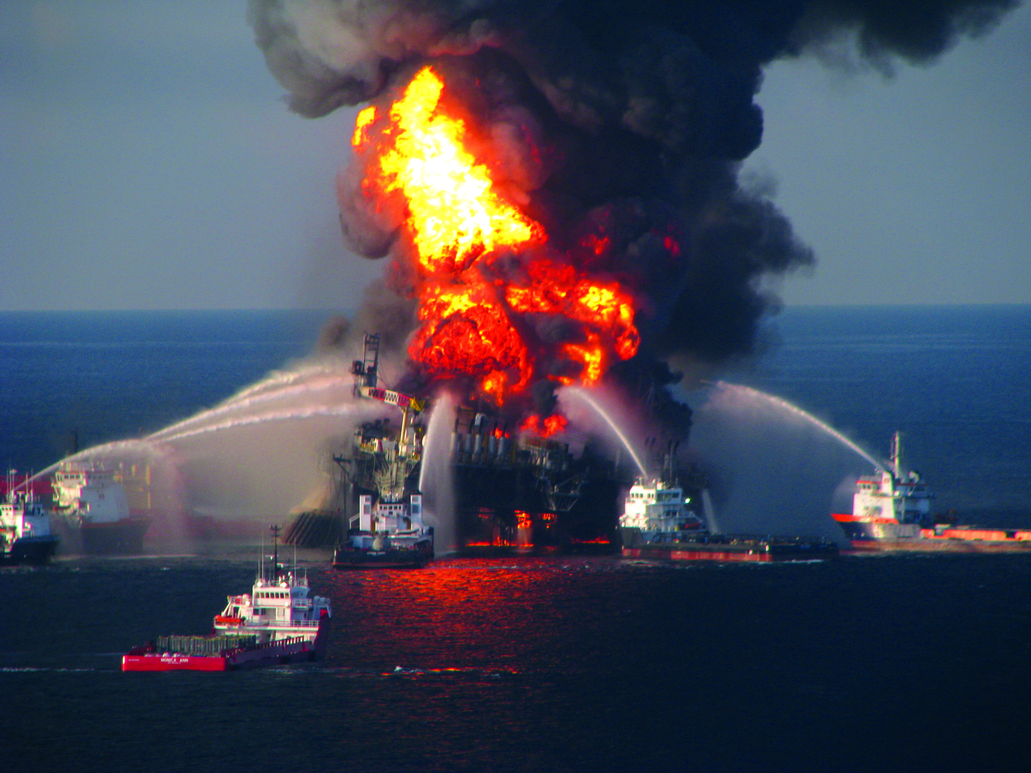 Offshore service vessels converge on the burning Deepwater Horizon in April 2010. Coast Guard photo.