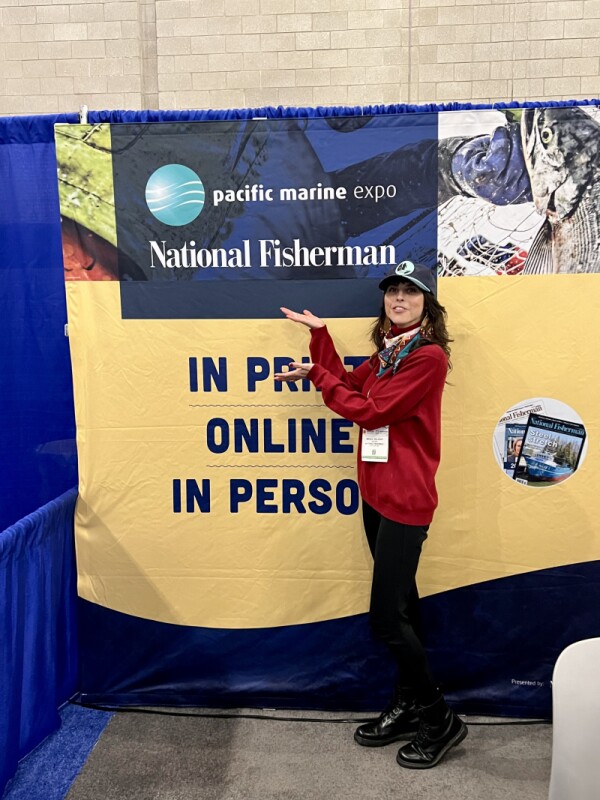 Writer Megan Waldrep at the National Fisherman booth at SENA 2023
