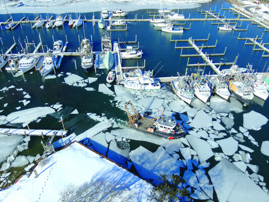 Fleet frozen in as county funds ice clearing efforts