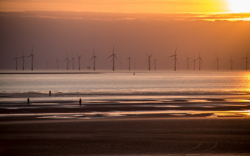 Sunrise over offshore wind.