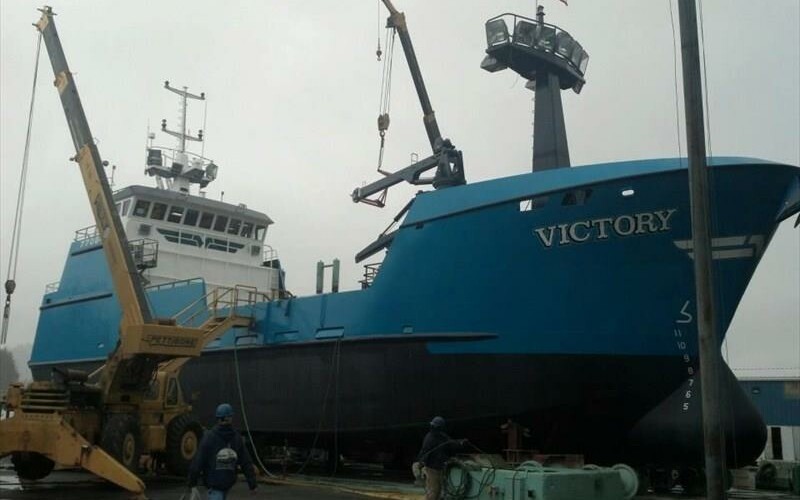 Fishing vessel Victory hauled out in boatyard.