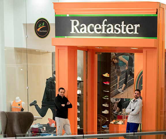 Two men outside of store