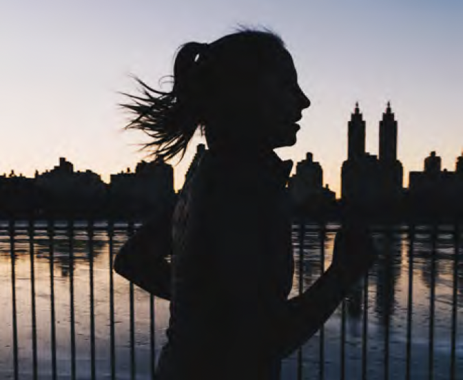 Wall Mural Running girl at sunset silhouette 