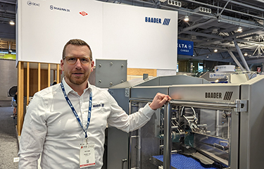 BAADER North America CEO Nils Rabe at the company's booth at Seafood Expo North America.