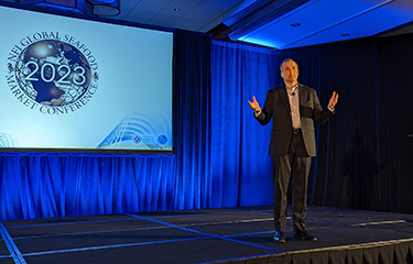 IRI Senior Vice President for Protein Practice Chris Dubois speaking during the Global Seafood Market Conference